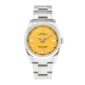 Rolex Oyster Perpetual 36 (Yellow Dial)
Price: ~₹6–7 Lakhs
Type: Automatic
Case Size: 36 mm
Water Resistance: 100 meters
Dial Feature: Lacquered yellow with baton hour markers
Other Specs: COSC-certified, Oystersteel case, perpetual rotor movement
Why It Slaps: This is what you get when you mix tradition with audacity. That minimalist yellow face is pure Rolex class—but with a rebellious twist.